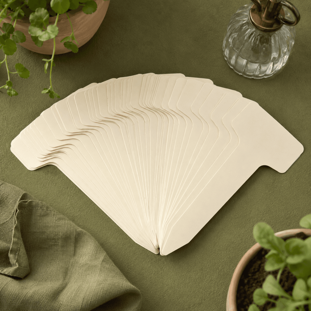 A bundle of forty blank cream plant label stakes